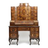 A SOUTH GERMAN WALNUT SHREIBSHRANK 18TH CENTURY AND LATER in two halves, the top with an arrangement
