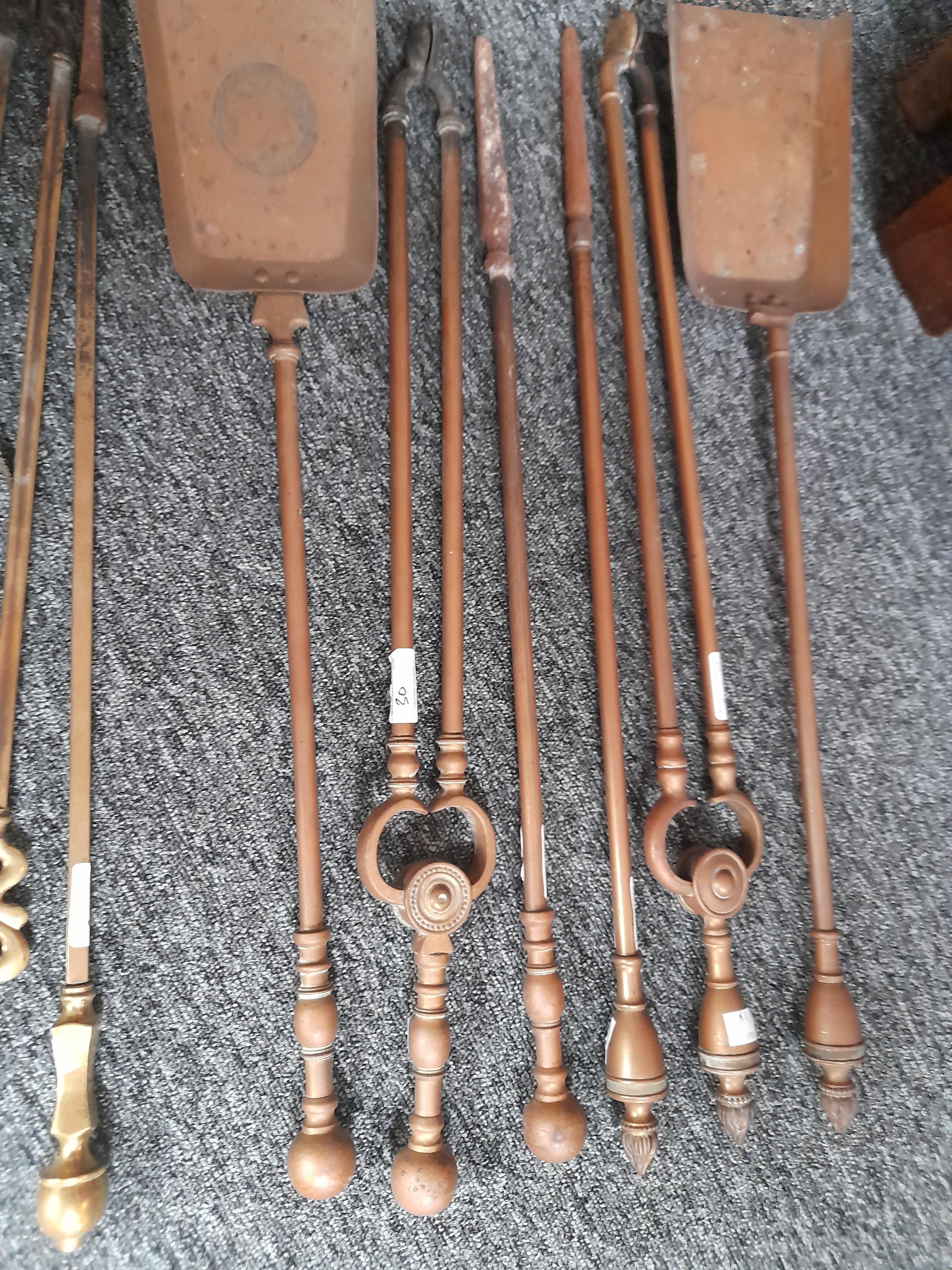 FOUR SETS OF BRASS FIRE IRONS 19TH CENTURY together with a pierced brass fire fender (13) 116.1cm - Bild 3 aus 19