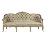 A GILTWOOD SOFA IN LOUIS XV STYLE MID-19TH CENTURY the moulded frame carved with leaves, flowers and