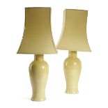 A PAIR OF CHINESE PORCELAIN VASE TABLE LAMPS 20TH CENTURY each with a lemon yellow glaze and of