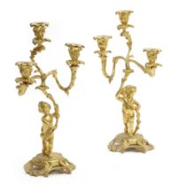 A PAIR OF FRENCH ORMOLU THREE-LIGHT CANDELABRA IN LOUIS XV STYLE 19TH CENTURY each modelled with a