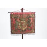 A LATE GEORGE III RED SILK DAMASK AND WIREWORK PENNANT OR BANNER EARLY 19TH CENTURY with an