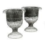 A LARGE PAIR OF WIREWORK GARDEN URNS EARLY 20TH CENTURY each with a removable liner and traces of