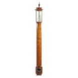 A GEORGE III SATINWOOD BOWFRONT STICK BAROMETER C.1800 the silvered gauge inscribed 'Wilson & Dixey'