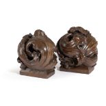 A PAIR OF OAK BOOKENDS LATE 19TH CENTURY carved with Tudor style scrolling foliage (2) 21cm high,