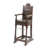 A CHARLES II OAK CHILD'S HIGHCHAIR 17TH CENTURY AND LATER the arched back carved with lunettes and a