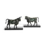 A PAIR OF BRONZE FIGURES OF A BULL AND A COW POSSIBLY FRENCH, 20TH CENTURY with dark green