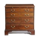 A GEORGE III MAHOGANY CHEST LATE 18TH CENTURY fitted with a brushing slide, above four long