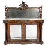 λ A VICTORIAN ROSEWOOD SERPENTINE SIDE CABINET C.1850-60 with a raised mirror back, above a marble