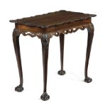 A MAHOGANY SILVER TABLE IN GEORGE II STYLE LATE 19TH CENTURY the moulded serpentine edge top above a