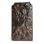 A CARVED WALNUT PANEL DEPICTING THE MADONNA AND CHILD ITALIAN OR SPANISH, 17TH CENTURY the figures
