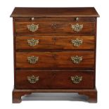 A GEORGE II MAHOGANY BACHELOR'S CHEST C.1750-60 the top with a moulded edge, above a brushing