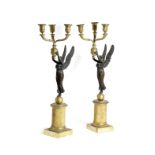 A PAIR OF FRENCH BRONZE AND GILT METAL THREE-LIGHT CANDELABRA IN EMPIRE STYLE MID-19TH CENTURY