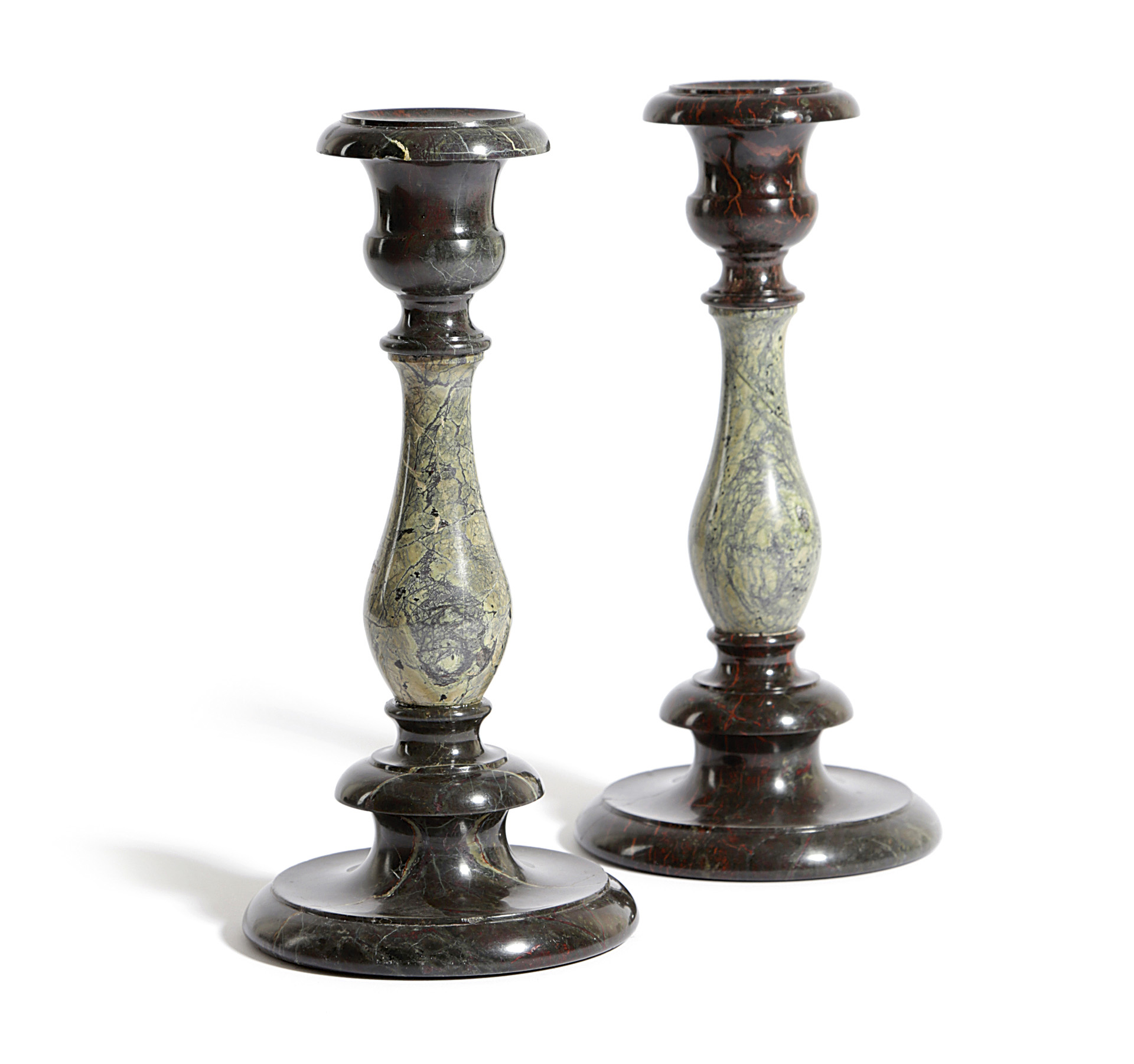 A PAIR OF CORNISH GREEN AND RED SERPENTINE CANDLESTICKS LATE 19TH / EARLY 20TH CENTURY each with