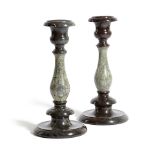 A PAIR OF CORNISH GREEN AND RED SERPENTINE CANDLESTICKS LATE 19TH / EARLY 20TH CENTURY each with
