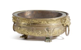 A DUTCH BRASS OVAL JARDINIERE 19TH CENTURY with repousse decoration and with lion's mask ring