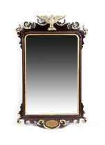 A MAHOGANY WALL MIRROR IN GEORGE II STYLE EARLY 20TH CENTURY with a bevelled plate and parcel gilt
