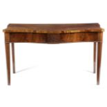 A GEORGE III MAHOGANY SERPENTINE SERVING TABLE LATE 18TH CENTURY the top with ebonised edging