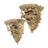 A PAIR OF VICTORIAN GILTWOOD AND COMPOSITION WALL BRACKETS IN GEORGE II STYLE, C.1870 each decorated