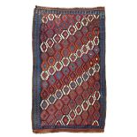 A TRIBAL KILIM PROBABLY VERAMIN, CENTRAL IRAN, C. 1930 the honeycomb lattice field of serrated