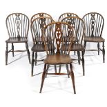 A HARLEQUIN SET OF SEVEN REGENCY ASH AND YEW WINDSOR KITCHEN CHAIRS LATE 18TH / EARLY 19TH CENTURY