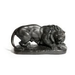 A BRONZE ANIMALIER FIGURE OF A LION PROBABLY FRENCH modelled crouching, snarling and looking to