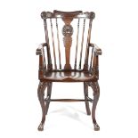 A VICTORIAN MAHOGANY ARMCHAIR BY WM. A. & S. SMEE, C.1880 the carved top rail above a vase shape