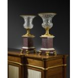 A PAIR OF FRENCH CHARLES X ORMOLU AND CUT-GLASS VASES C.1830 of Campana shape, the rims with stiff