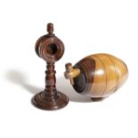 A TREEN WATCH STAND 19TH CENTURY with an acorn finial, knopped stem and stepped foot, together