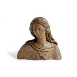 A LIMEWOOD BUST OF THE VIRGIN MARY IN 17TH CENTURY STYLE carved looking slightly to her right 35cm