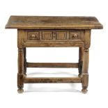 A SPANISH WALNUT SIDE TABLE LATE 17TH CENTURY / EARLY 18TH CENTURY the frieze drawer with a panelled