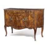 AN ITALIAN WALNUT COMMODE 18TH CENTURY AND LATER the shaped quarter veneered top above a pair of