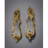 A PAIR OF GEORGE GILTWOOD GIRANDOLES C.1750-60 each with a later shaped mirror plate within a scroll