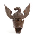 AN OAK HERALDIC WALL CREST LATE 19TH / EARLY 20TH CENTURY carved with an eagle appearing from a