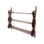 A SET OF MAHOGANY WALL SHELVES 19TH CENTURY with pierced ends 78.7cm high, 89cm wide, 16.5cm deep