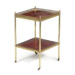 A GILT BRASS ETAGERE 20TH CENTURY with two tiers inset with gilt tooled red leather, on brass