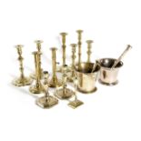 A COLLECTION OF EIGHT PAIRS OF BRASS CANDLESTICKS 18TH CENTURY AND LATER of various forms, some with