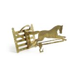 A VICTORIAN BRASS WALL HANGING BRACKET C. 1870-80 in the form of a horse running before a gate