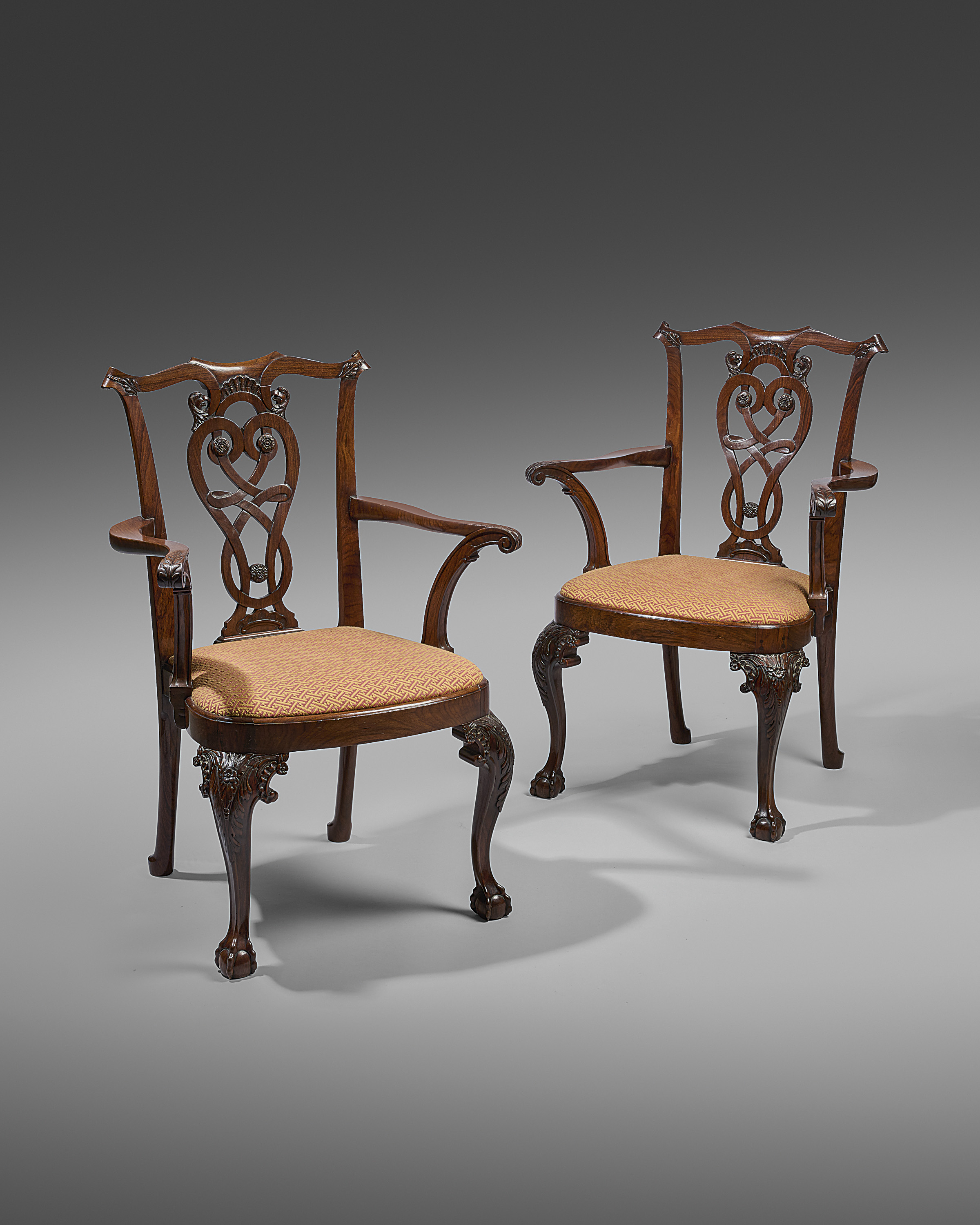 A RARE PAIR OF ANGLO-CHINESE EXPORT PADOUK ARMCHAIRS IN IRISH STYLE, MID-18TH CENTURY each with a