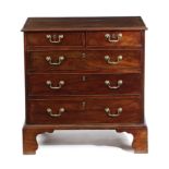 A GEORGE III MAHOGANY CHEST C.1790 of two short and three long drawers, on shaped bracket feet 83.