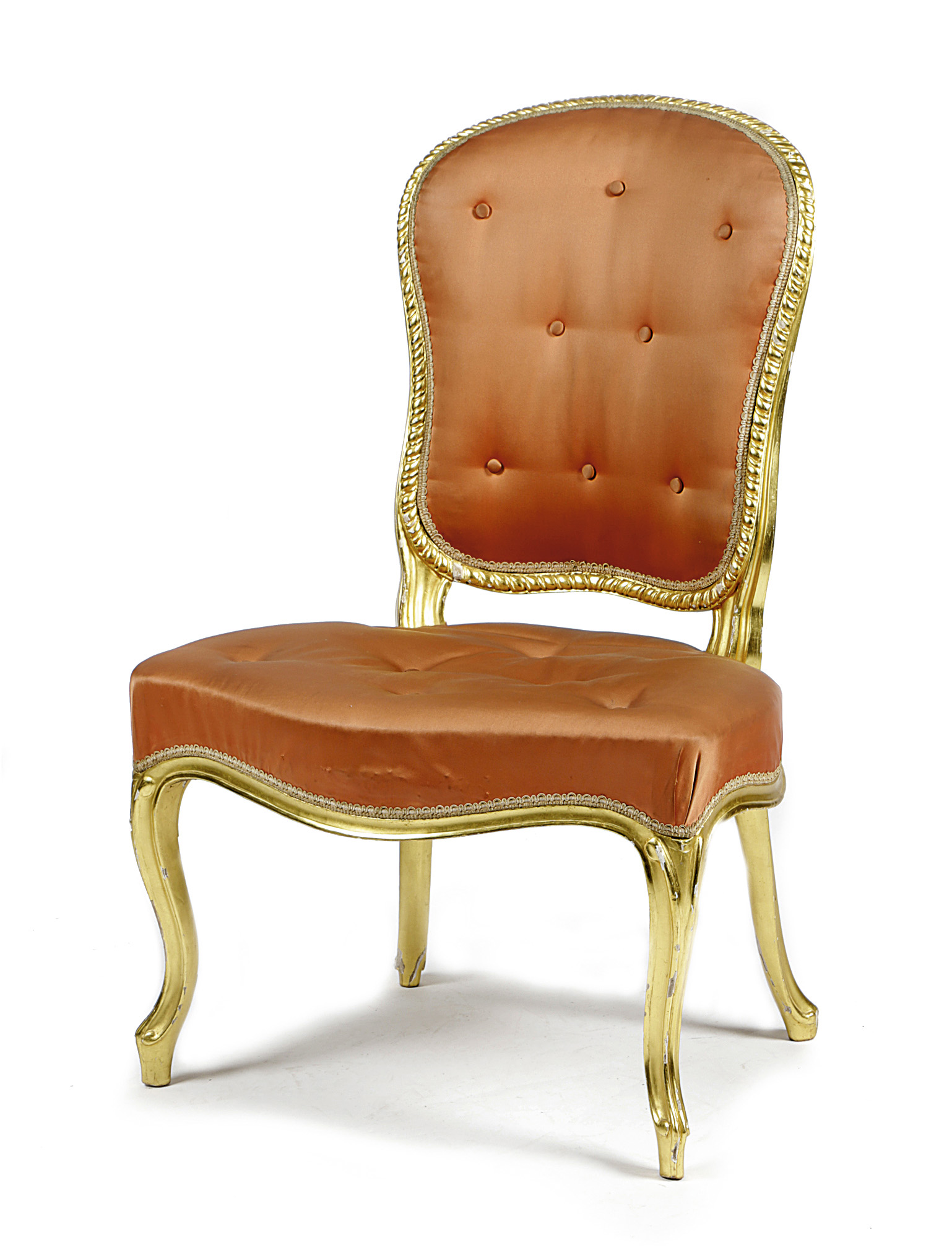 A GEORGE III GILTWOOD SIDE CHAIR IN THE FRENCH MANNER, LATE 18TH CENTURY the padded back and seat