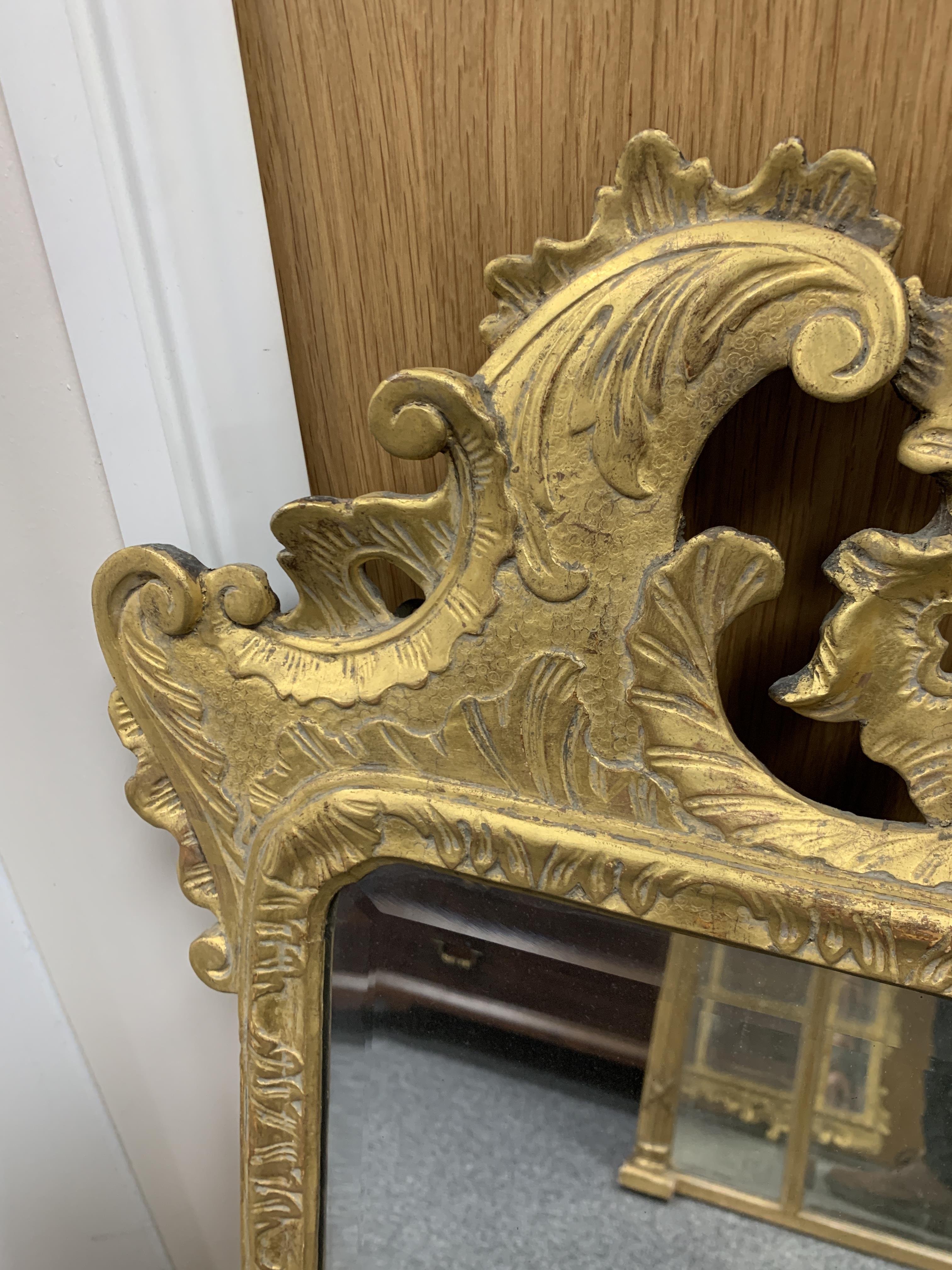 A GEORGE II GILTWOOD WALL MIRROR C.1735 the later arched bevelled plate within a leaf carved - Bild 4 aus 14