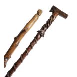 A FOLK ART HOLLY WALKING STICK LATE 19TH CENTURY the handle in the form of Emperor Wilhelm I;