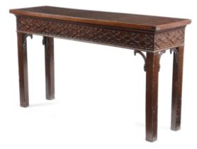 A GEORGE III MAHOGANY SERVING TABLE C.1770 with a blind fretwork frieze above chamfered legs with