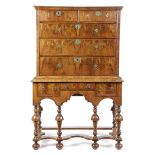 A WILLIAM AND MARY WALNUT CHEST ON STAND LATE 17TH / EARLY 18TH CENTURY AND LATER with two short and