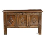 AN OAK TRIPLE PANELLED COFFER LATE 17TH / EARLY 18TH CENTURY the moulded top enclosing a later till,