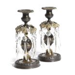 A PAIR OF REGENCY GILT AND PATINATED BRONZE CANDLESTICKS EARLY 19TH CENTURY a gadrooned sconce above