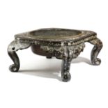 A JAPANESE BLACK LACQUER AND MOTHER OF PEARL STAND 19TH CENTURY decorated with scrolling leaves,