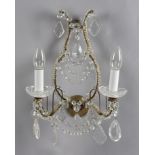 A PAIR OF ITALIAN GLASS WALL LIGHTS each with a pair of sconces on beadwork scrolling supports and