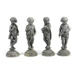 A SET OF FOUR LEAD GARDEN FIGURES EMBLEMATIC OF THE FOUR SEASONS POSSIBLY BY CROWTHER